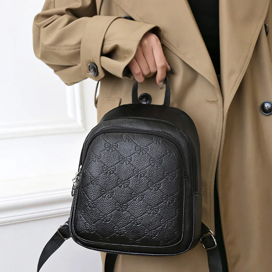 Men's and women's travel small backpack with bow pattern design, suitable for school trips and schoolbags for books